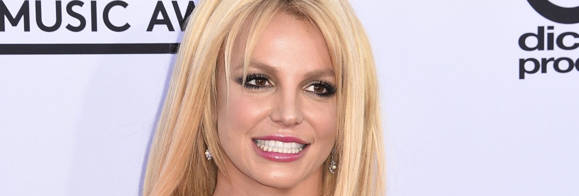 (FILES) This file photo taken on May 17, 2015 shows singer Britney Spears at the 2015 Billboard Music Awards at the MGM Grand Garden Arena in Las Vegas, Nevada. Britney Spears, who soared to stardom as a teen idol before a highly public fall, is releasing an album one more time. Spears announced August 3, 2016 that her ninth album, "Glory, " will come out on August 26. "My new album and the beginning of a new era, " Spears wrote on Twitter. Spears last month released a first song, "Make Me..., " a steamy track with a touch of tropical house music and a contribution by the rapper G-Eazy. / AFP PHOTO / ROBYN BECK